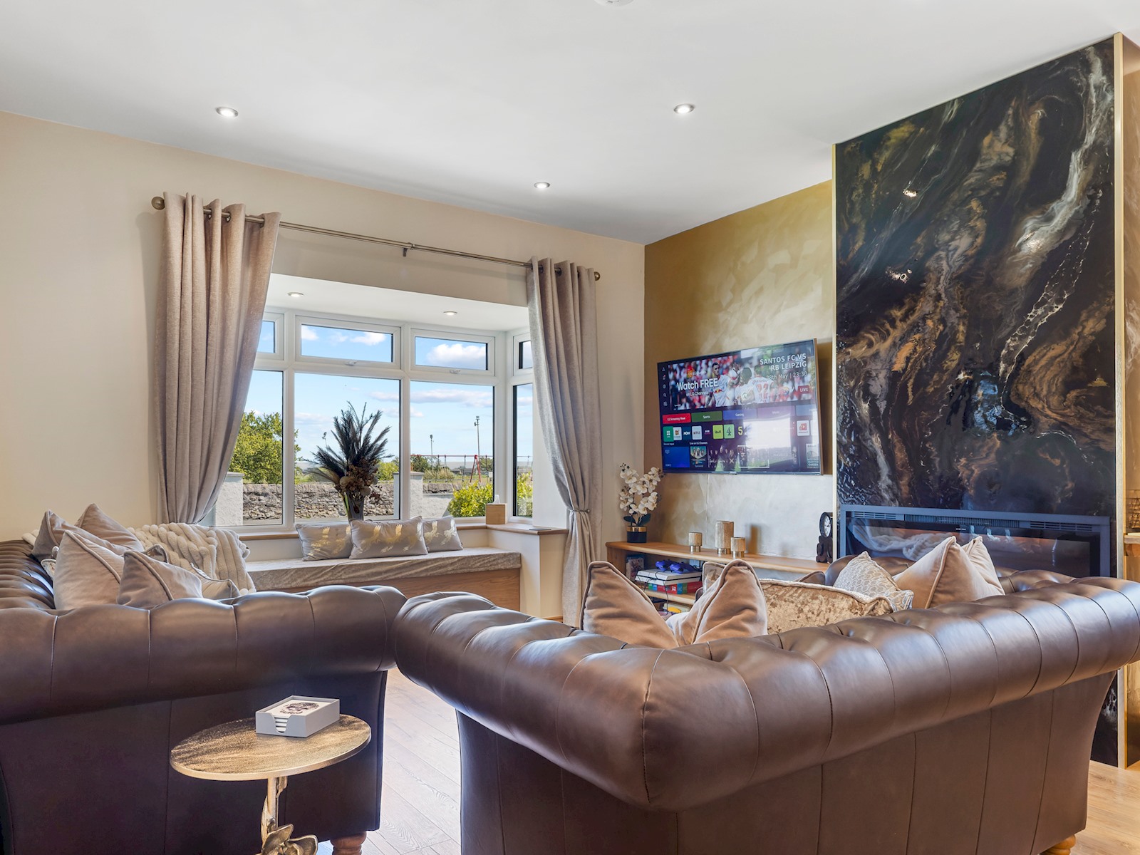 Accessible bathroom with grab rails and step-free shower